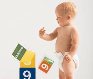 toddler knocking over blocks