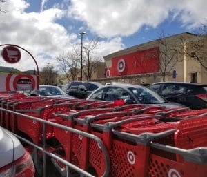 Target store with carts lined up outside. A Target baby registry must haves list.