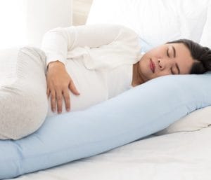 Pregnant mom to be sleeping. Twin pregnancy sleep tips.