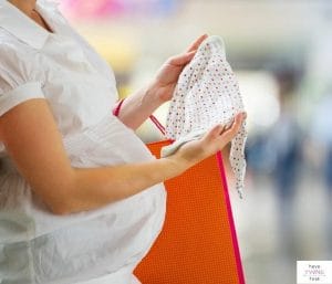 Pregnant mom shopping for baby. This article is all about how a baby registry works.